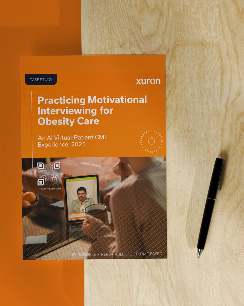Printed Xuron case study report titled “Practicing Motivational Interviewing for Obesity Care” on desk with pen